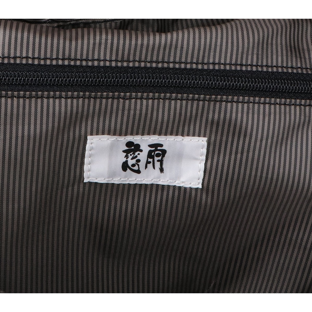 慈雨 ジウ ナイロンxレザー ドット柄カットワークフラップ リュック バックパック