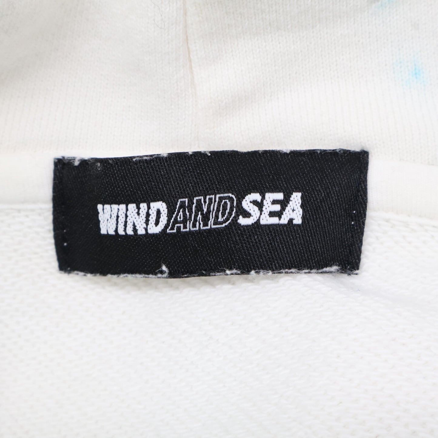 WIND AND SEA ウィンダンシー ×HUF ﾎﾜｲﾄ ｸﾞﾗﾃﾞｰｼｮﾝ ﾌﾟﾙﾊﾟｰｶｰ トップス L