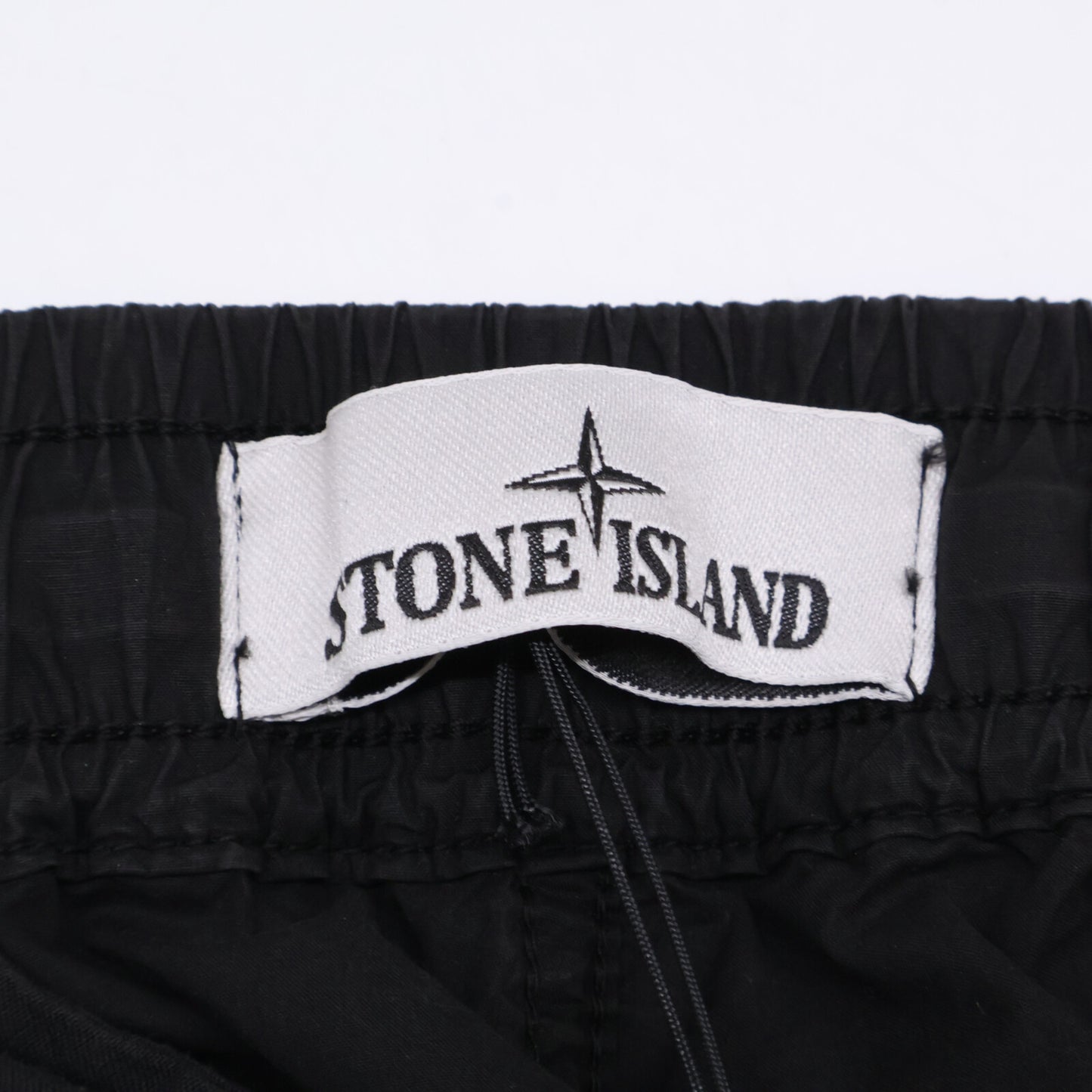 STONE ISLAND ストーンアイランド 24年製 ﾌﾞﾗｯｸ STRETCH COTTON TELA PARACADUTE ｶｰｺﾞﾊﾟﾝﾂ ボトムス 32