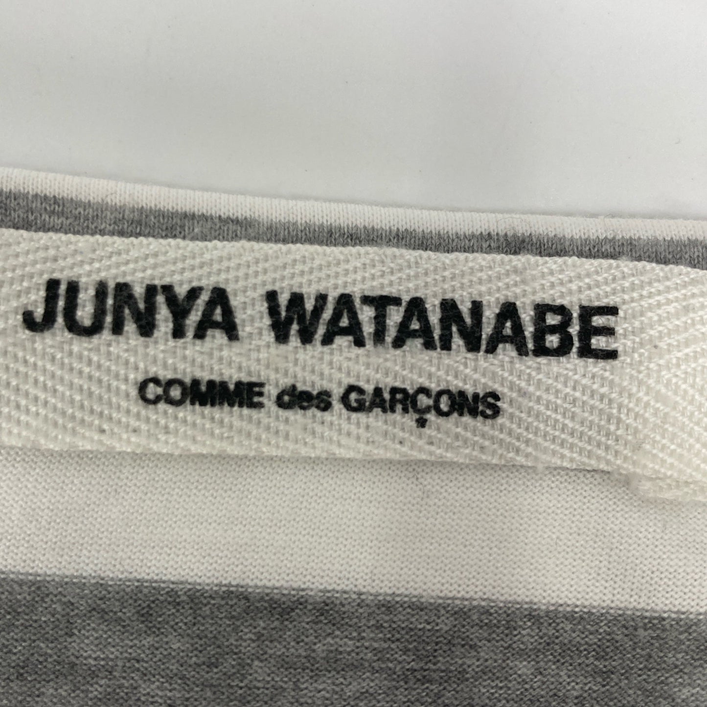 COMMEdesGARCONS JUNYA WATANABE コムデギャルソンジュンヤワタナベ JI-T032 ﾊﾞﾀﾌﾗｲ ﾎﾞｰﾀﾞｰｶｯﾄｿｰ トップス 表記なし