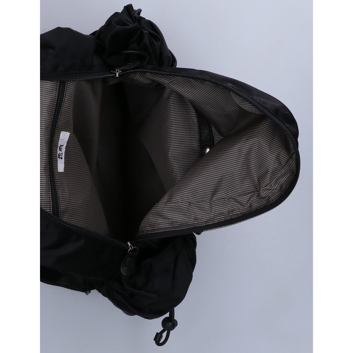 慈雨 ジウ ナイロンｘレザー ドット柄カットワークフラップ リュック バックパック