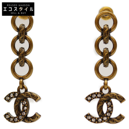 CHANEL シャネル I24A ｺﾞｰﾙﾄﾞ ｽｲﾝｸﾞｺｺﾏｰｸ ﾗｲﾝｽﾄｰﾝ ﾋﾟｱｽ ピアス