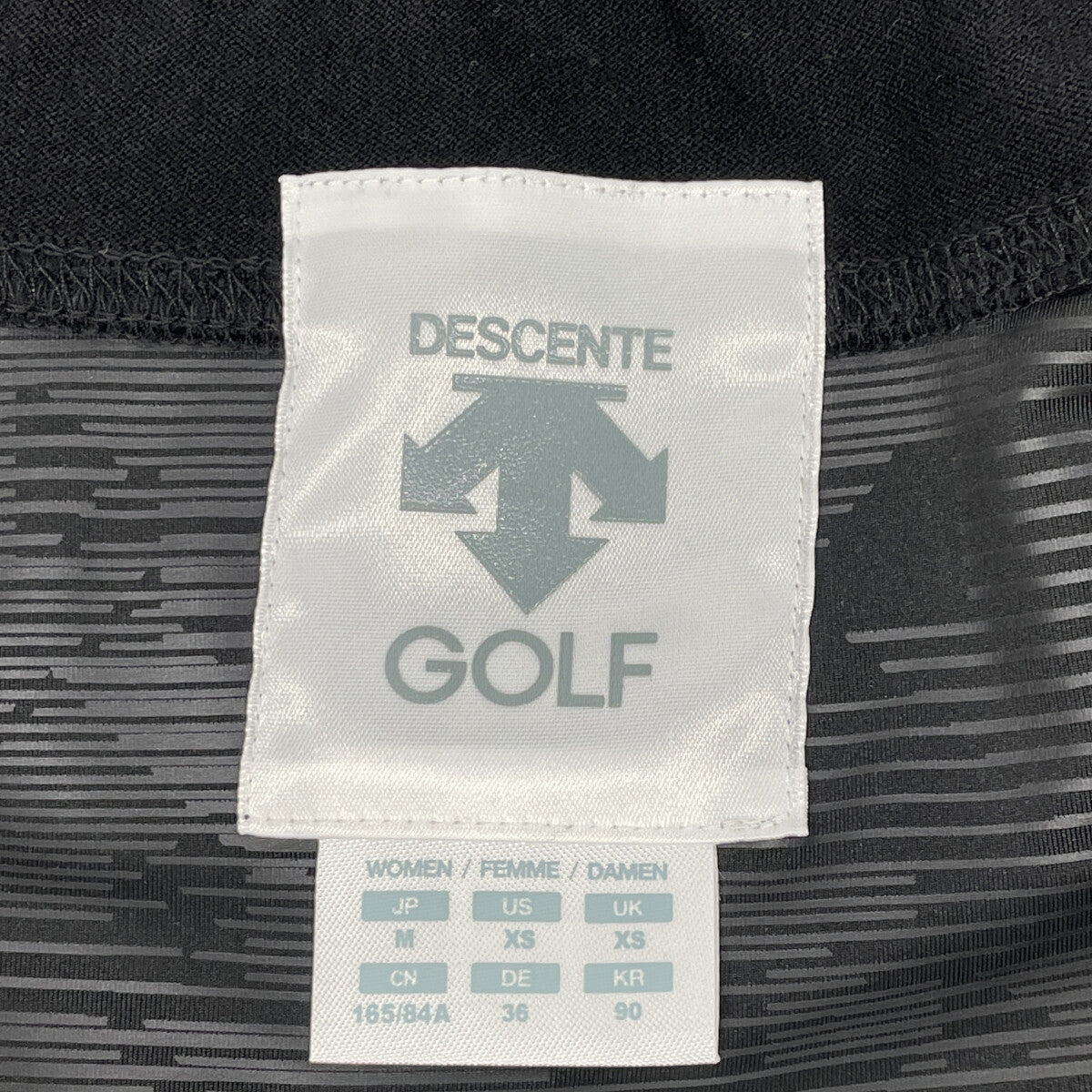 DESCENTE デサント ﾎﾜｲﾄ×ﾌﾞﾗｯｸ ﾄﾞｯｷﾝｸﾞ ﾄｯﾌﾟｽ トップス M